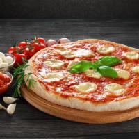 Margherita Pie · Plum tomato basil sauce with homemade fresh mozzarella and a touch of olive oil.