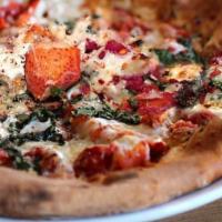 Fra Diavolo Pie · Plum tomato basil sauce with crumbled sausage, sliced hot cherry peppers and homemade fresh ...