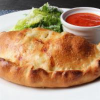Calzone · Comes with seasoned ricotta and mozzarella. Add ham, pepperoni, sausage or meatball for an a...