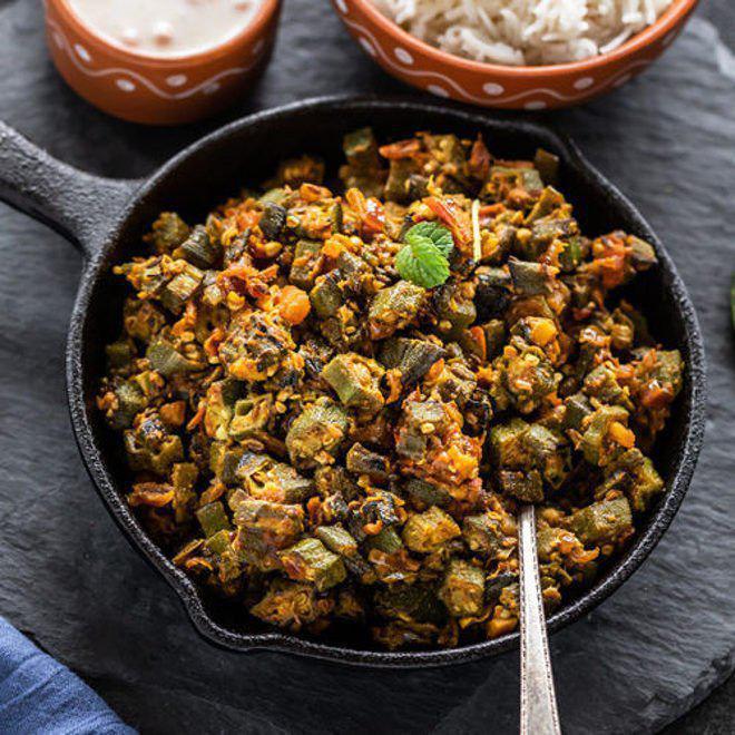 Bhindi Masala Masti[Vegan] · Fresh okra sauteed with onions, garlic and tomatoes.
