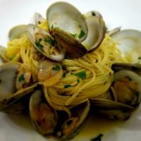 Linguine Alle Vongole · Little neck clams served over linguine garlic & oil, white wine, herbs 
