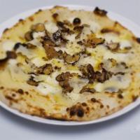 Tartufata Pizza · Fior di latte, porcini, shaved Parmigiana, black truffle carpaccio.