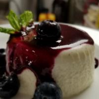 pannacotta · home made egg less custard with blueberry compote