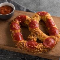 Pepperoni Pretzel · The Original pretzel topped with nine slices of pepperoni and a savory three-cheese blend.