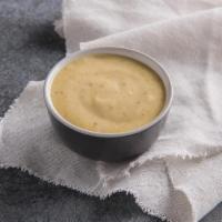 Honey Mustard Dip · Everything goes better with Honey Mustard. But nothing goes quite as well as an Auntie Anne’...