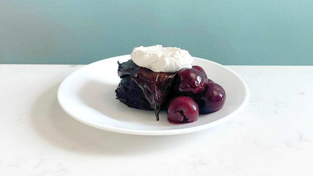 Black Forest Cake · Decadent EVOO devil's food cake glazed with a rich honey ganache. Accompanied by sweet, yet tart dark cherries all topped off with a light mascarpone whip. | Allergen: Milk, Egg