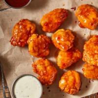 Boneless Wings - 10 · All the flavor, none of the obstructions. Our tender, tasty Boneless Wings, served with Ranc...