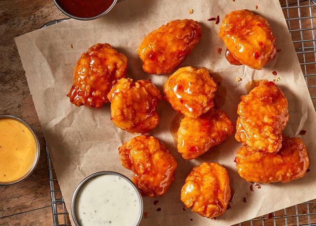 Boneless Wings - 20 · All the flavor, none of the obstructions. Our tender, tasty Boneless Wings, served with Ranch Sauce, tossed in the sauce of your choice. (1690-2060 Cal)