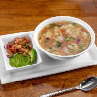 Tortilla Soup · Chicken soup, crispy tortilla strips, tomato, onion, cilantro, avocado, and Monterey cheese.