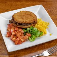 Gorditas · 1 piece. Stuffed homemade corn tortilla with your choice of meat, refried beans, lettuce, to...