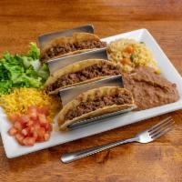 Crispy Tacos · 3 pieces. Corn tortillas, ground beef or shredded chicken, lettuce, tomatoes, cheese, served...