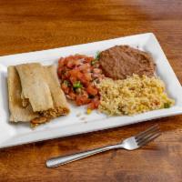 Tamale Plate · 3 pork tamales, rice, beans, and pico de gallo.