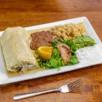 Jalisco Changa · Fried burrito stuffed with your choice of meat, beans, and cheese, topped with queso dip, se...