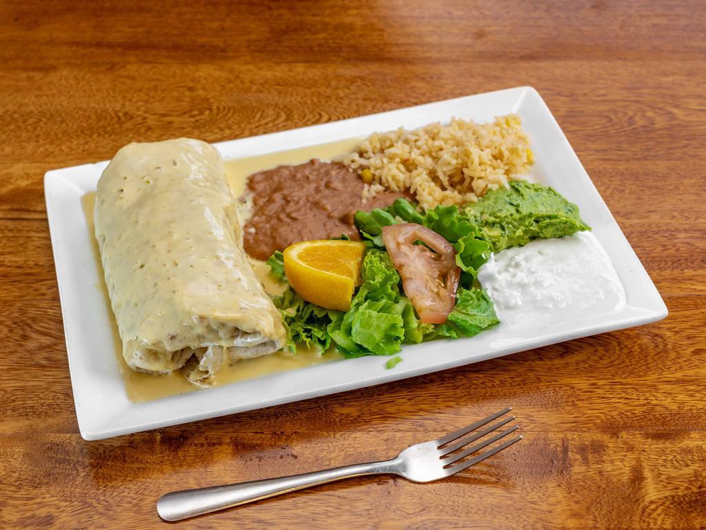 Jalisco Changa · Fried burrito stuffed with your choice of meat, beans, and cheese, topped with queso dip, served with rice, beans, guacamole and salad. 
