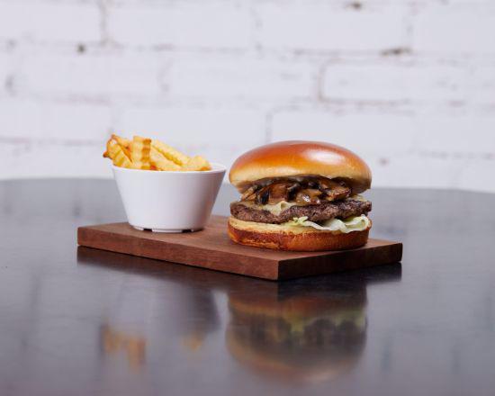 Shroom & Swiss · Swiss cheese, sauteed mushrooms, sauteed onions, mayo and
lettuce on a brioche bun.