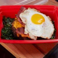 Keto Recovery Burger · Our delicious grass-fed beef burger, turkey bacon cheddar
cheese, and a fried egg on top of...