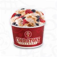 Cheesecake Fantasty® Ice Cream · Cheesecake ice cream with graham cracker pie crust, blueberries and strawberries.
