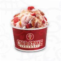 Our Strawberry Blonde · Strawberry ice cream with graham cracker pie crust, strawberries, caramel and whipped toppin...