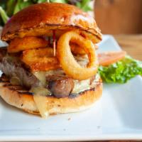 Ahi Tuna Burger · Soy Marinated Tuna Steak, Honey Wasabi Mayo, Tempura Onion Rings 