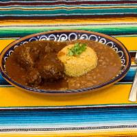 Mole Poblano · Chicken in a traditional pueblan chocolate mole sauce.