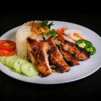 Grilled Chicken Rice Bowl · Grilled lemongrass chicken, jasmine rice, mixed spring greens, pickled carrot and daikon, cu...