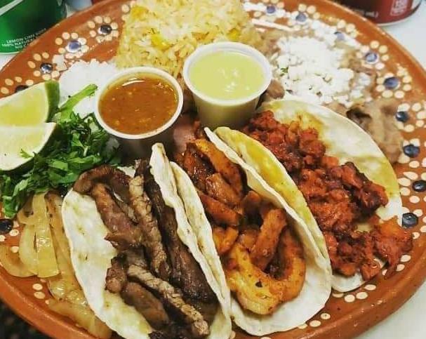 TACO PLATE  · Rice and Beans 3 tacos of your choice, onions, cilantro, limes and hot sauces onside 