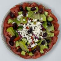 Greek Salad · Feta cheese, Oregano, Lettuce, Tomatoes, Red pepper, Cucumber, Kalamata olives, Red onion, L...