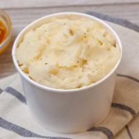 Mashed Potatoes & Gravy · Only the good stuff goes in here: real potatoes, milk, butter, and cracked black pepper. It’...
