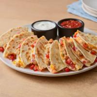 Chipotle Lime Chicken Quesadilla · Chipotle lime chicken, fresh pico, and a blend of melted cheddar cheese. Served with green c...