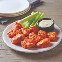 Boneless Wings · Crispy breaded pieces of tender boneless chicken tossed in your choice of sauce and dressing.