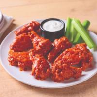 Double Crunch Bone-In Wings · Twice battered and fried, these crisp outside, tender inside wings and tossed in a choice of...