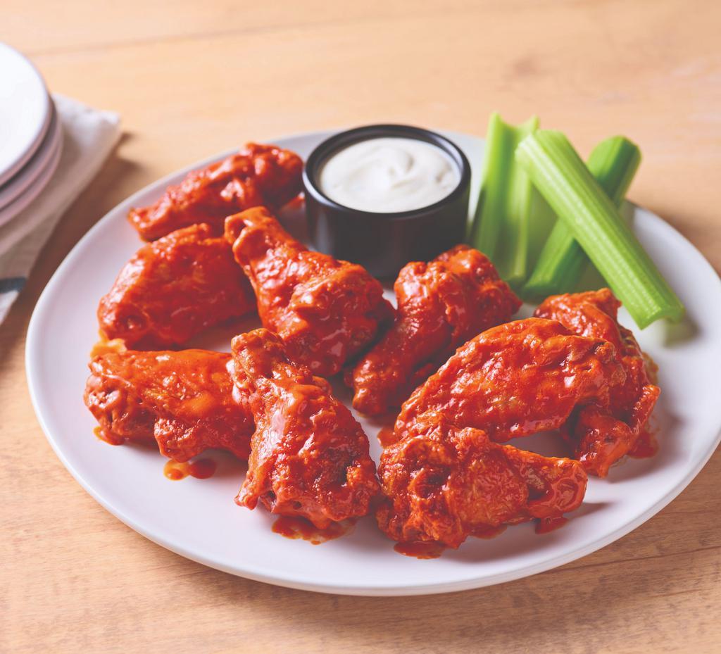 Double Crunch Bone-In Wings · Twice battered and fried, these crisp outside, tender inside wings and tossed in a choice of sauce. Gluten-sensitive.