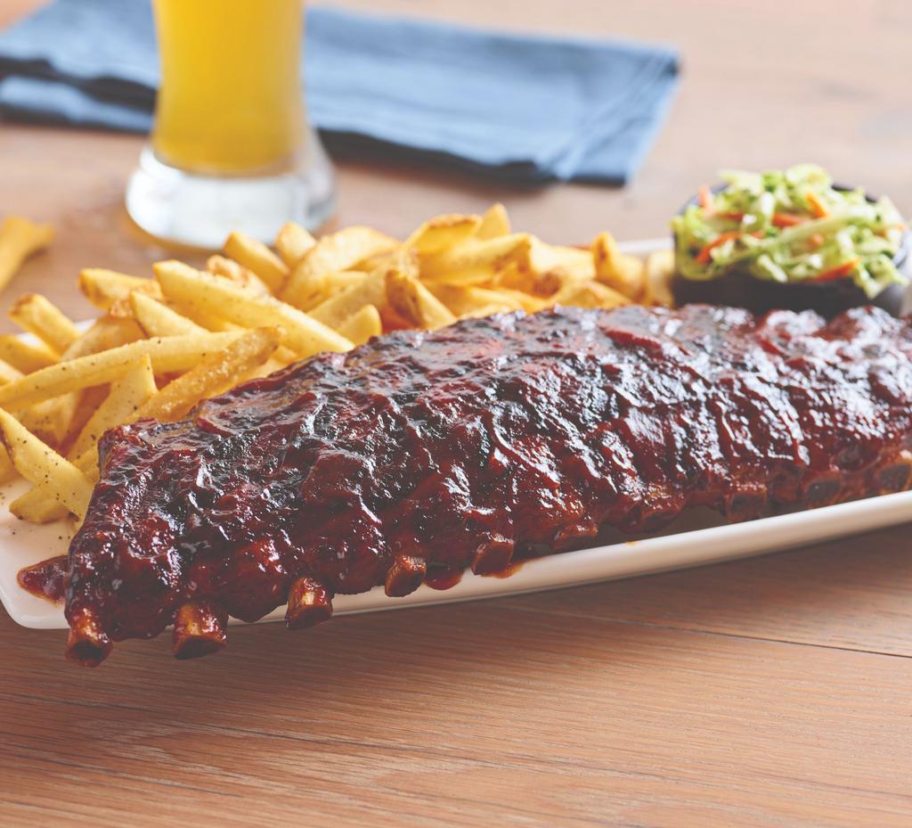 Double-Glazed Baby Back Ribs · Slow-cooked to fall-off-the-bone tenderness. Slathered with your choice of sauce.