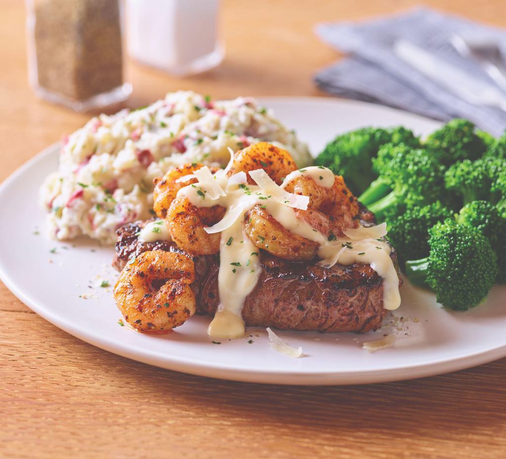 Shrimp 'n Parmesan Sirloin* · A popular take on surf ‘n turf, this dish starts with a tender grilled 8 oz. USDA Choice top sirloin and is topped with sautéed blackened shrimp and our creamy lemon butter Parmesan sauce. Served with broccoli and garlic mashed potatoes.