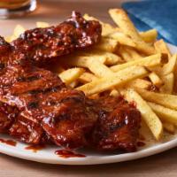 Applebee's Riblet Basket · Smaller portion of an Applebee's original! Our famous slow cooked riblets, slathered in your...