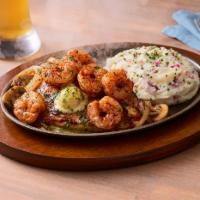 Bourbon Street Chicken and Shrimp · Let the good times roll with Cajun seasoned chicken and blackened shrimp in garlic butter se...