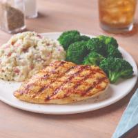 Grilled Chicken Breast · Juicy chicken breast seasoned and grilled over an open flame. Served with broccoli and garli...