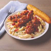 4 Cheese Mac and Cheese with Honey Pepper Chicken Tenders · Four-cheese Mac & Cheese is topped with crispy breaded chicken tenders tossed in honey peppe...