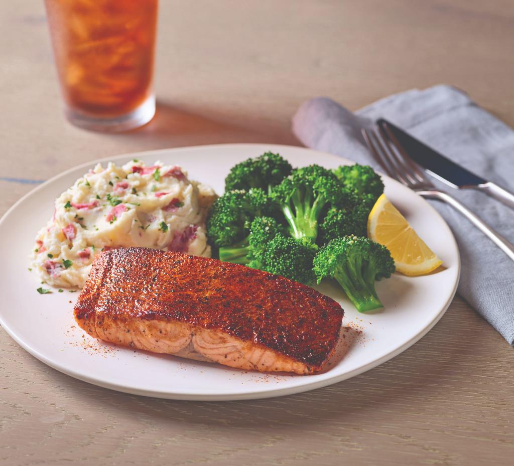 Blackened Cajun Salmon · 6 oz. blackened salmon fillet grilled to perfection. Served with broccoli and garlic mashed potatoes.