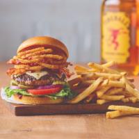 Whiskey Bacon Burger · Savor the rich flavor in this tasty original. An all-beef patty topped with two slices of Pe...