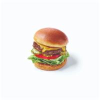 Kids Cheeseburger  · Ground beef burger served on a toasted bun with American cheese, lettuce, tomato and pickles...