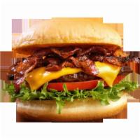 Bacon Cheeseburger deluxe  · 100% Beef With Bacon ,lettuce, tomato and onions. Served with fries .