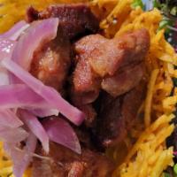 Plantain Basket Fried Pork · The basket is made from green plantains that are shredded and then fried for a crispy and li...