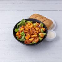 Crispy Buffalo Chicken Salad · Lettuce, tomatoes, cucumbers, and onions topped with chicken. Choice of sauce. 