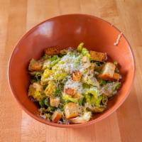 Classic Caesar Salad · Romaine lettuce tossed in house caesar dressing with house made croutons and fresh grated Pa...