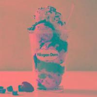 Mint Chip Dazzler Sundae · Mint chip ice cream layered with hot fudge and chocolate cookie pieces topped with whipped c...