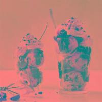 Cookies and Cream Dazzler Sundae · Cookies and cream ice cream layered with hot fudge and chocolate cookie pieces topped with w...
