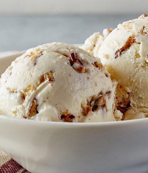 Butter Pecan Ice Cream · An American classic, revisited with our passion for singular flavor. We blend spoonful after spoonful of buttery roasted pecans with pure, sweet cream to create a delight like no other.