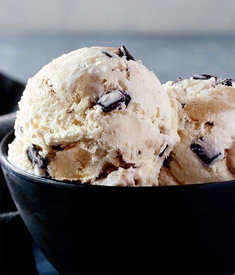 Cookie Dough Ice Cream · For those who relish a taste of something playful, we re-created a childhood treat. We blend chunks of buttery cookie dough and sweet fudge chips with our finest pure vanilla ice cream. Ah, such sweet memories. 

