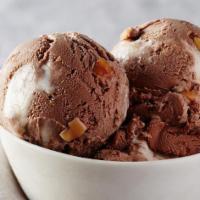 Rocky Road Ice Cream · Velvety swirls of marshmallow, roasted almonds, and our legendary chocolate ice cream come t...